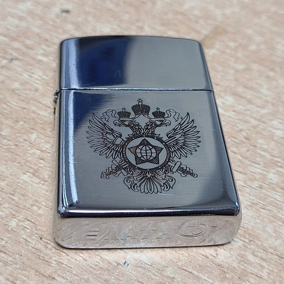 Гравировка герба на зажигалке Zippo в Воронеже
